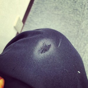 Old, torn slacks, new web address